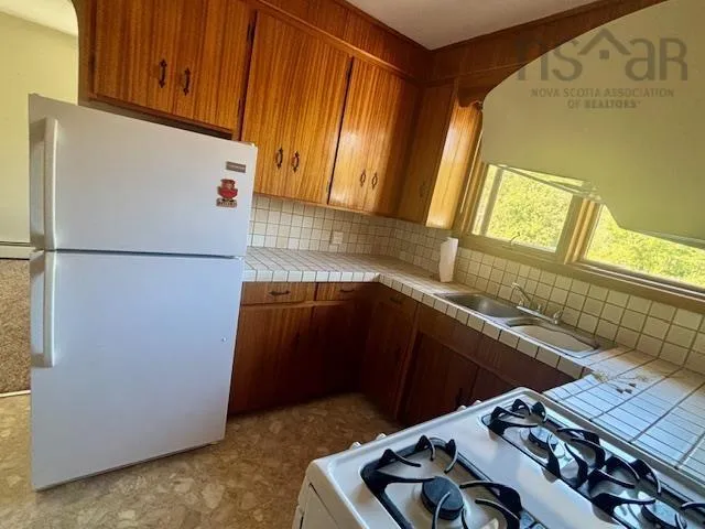 2695 Lingan Road, Lingan, NS B1H 5E7, 4 Bedrooms Bedrooms, ,1 BathroomBathrooms,Residential,For Sale,Lingan,202523627