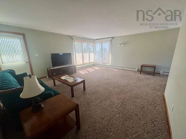 2695 Lingan Road, Lingan, NS B1H 5E7, 4 Bedrooms Bedrooms, ,1 BathroomBathrooms,Residential,For Sale,Lingan,202523627
