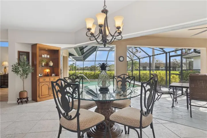 Gathering / Family space with a wealth of natural light and a notable chandelier