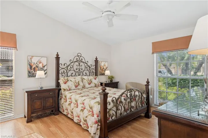 Bedroom featuring ceiling fan and light wood-type flooring