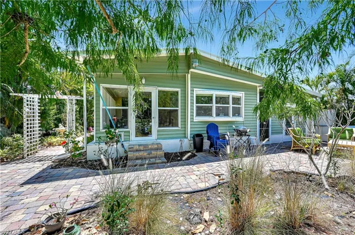 Rear view of house with a patio area
