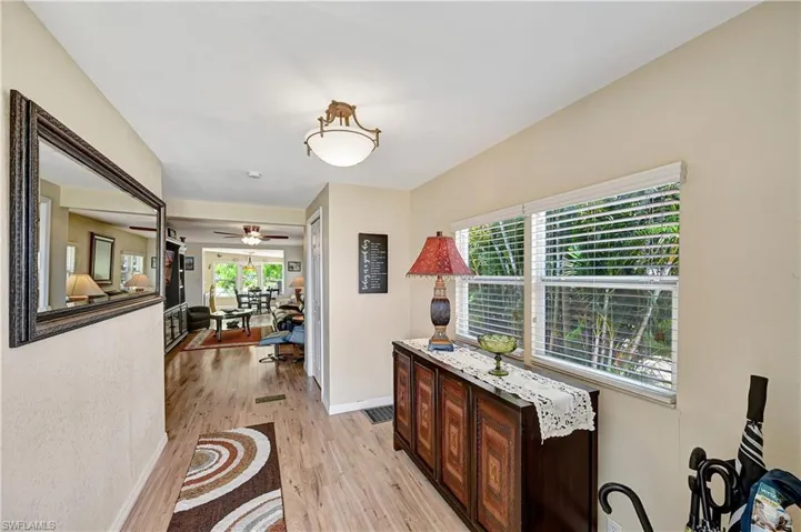Corridor featuring light hardwood / wood-style floors