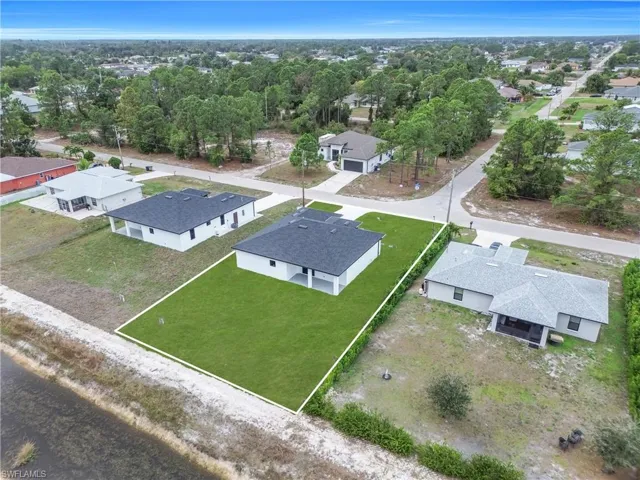 Aerial perspective of suburban area with property parcel outlined