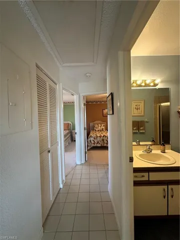 Hallway featuring large closet.