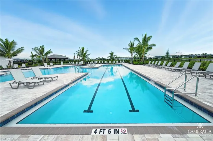 Community pool with a patio area