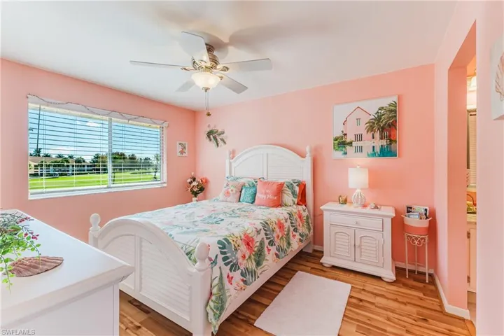 Bedroom with light wood-style flooring and ceiling fan
