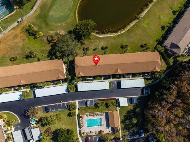 Aerial overview of property's location featuring a pool