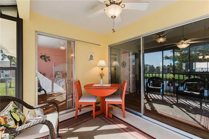 Sunroom with a ceiling fan