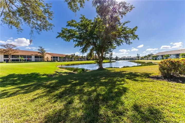 View of grassy yard featuring a water view
