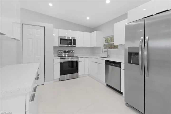 2100 NE 14th  PL, Cape Coral, FL 33909
