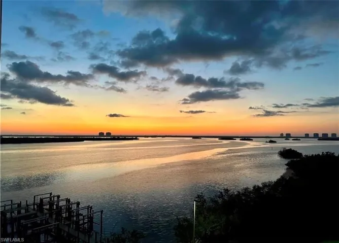 View of water feature featuring a boat dock Virtually edited image