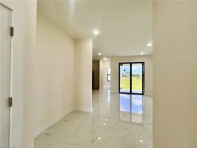 Spare room featuring tile flooring