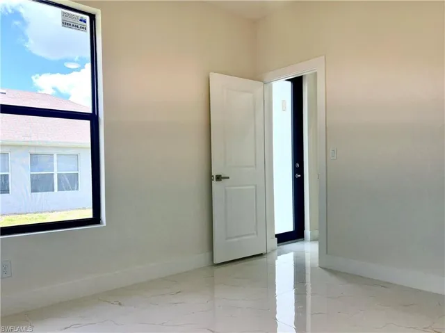 View of tiled spare room