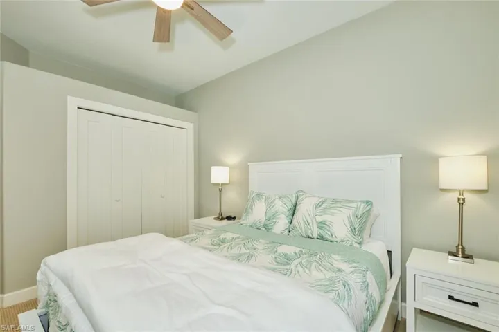Bedroom featuring a closet and ceiling fan
