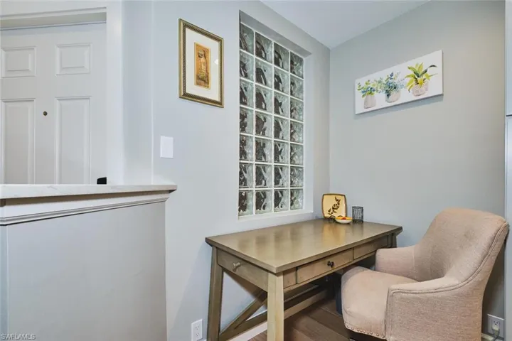Home office featuring wood finished floors