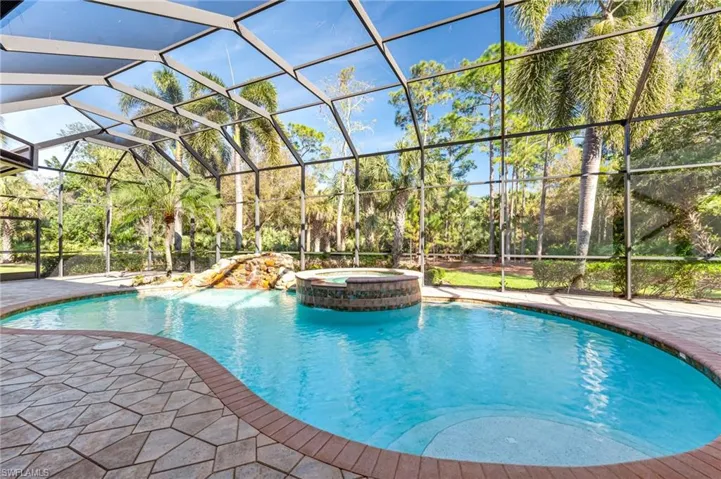 View of pool featuring a lanai and a patio