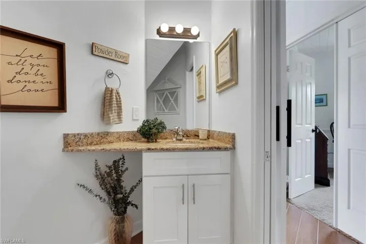Dining room with breakfast area, light wood-type flooring, and french doors