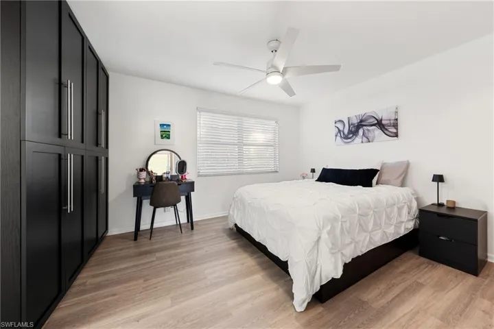 Bedroom featuring light wood finished floors and ceiling fan