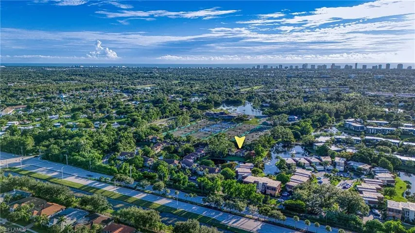 Aerial overview of property's location featuring skyline
