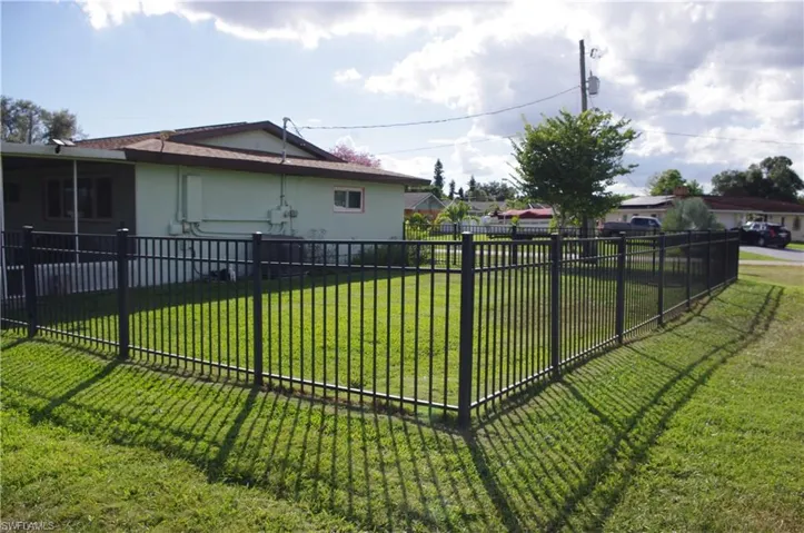 View of fenced backyard