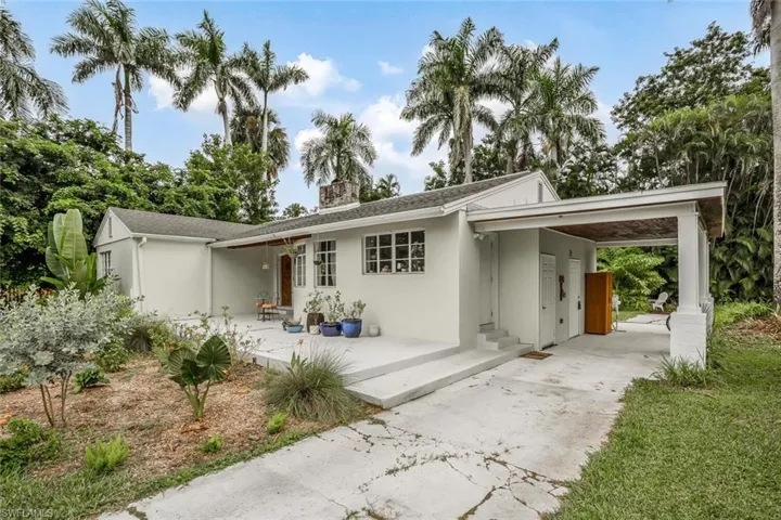 Carport with extended driveway!