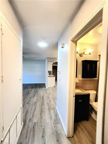 Hall featuring hardwood / wood-style flooring
