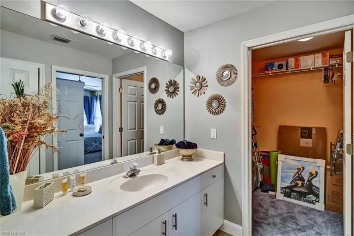 This is the other part of the Guest Bath. There is a door between the previous photo and this photo that separates the hallway bath from the guest bedroom entry to this part of the bath.