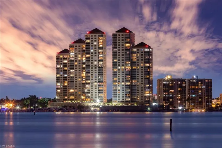 Outdoor building at dusk with a water view