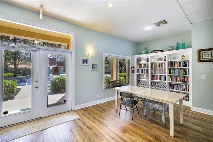 Dining area featuring hardwood / wood-style floors and baseboards