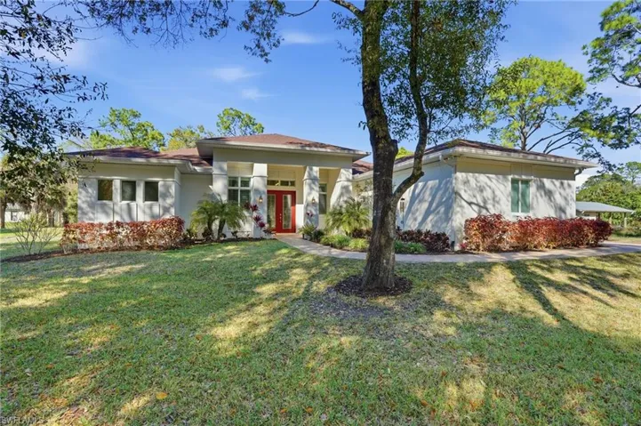 Front View with paver walkway and beautiful front entry lead glass doors