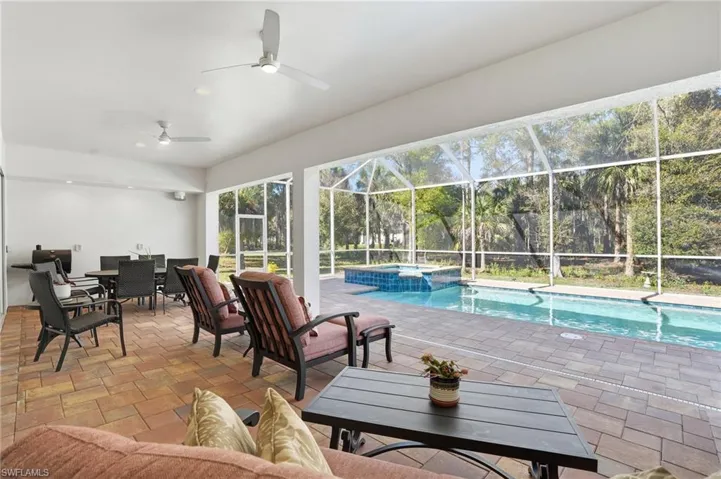Relax on under your long covered lanai and extended pool deck