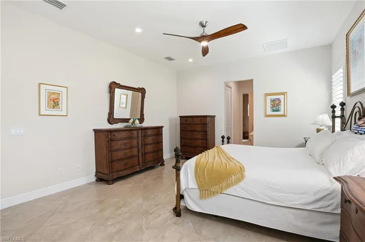 Bedroom featuring a ceiling fan and recessed lighting