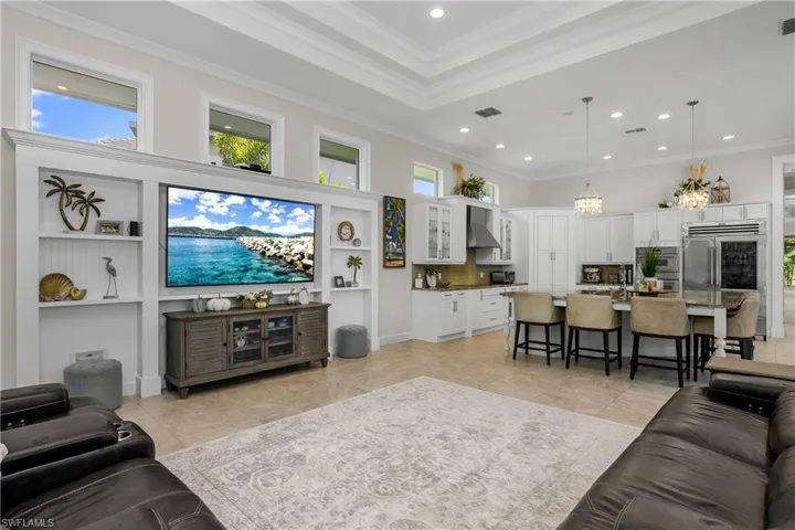 This great room merges seamlessly with the kitchen.