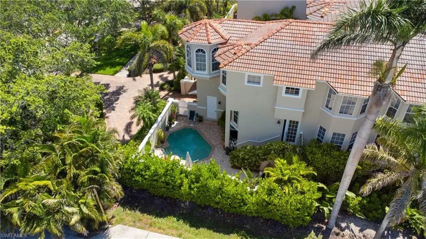 View of swimming pool featuring a patio area and a fenced backyard