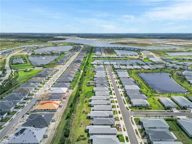 Aerial overview of property's location and nearby suburban area