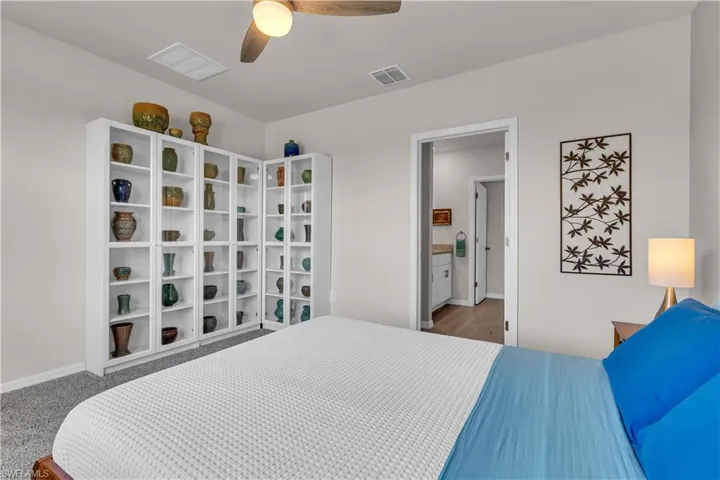 Master Bedroom featuring a ceiling fan and carpet floors