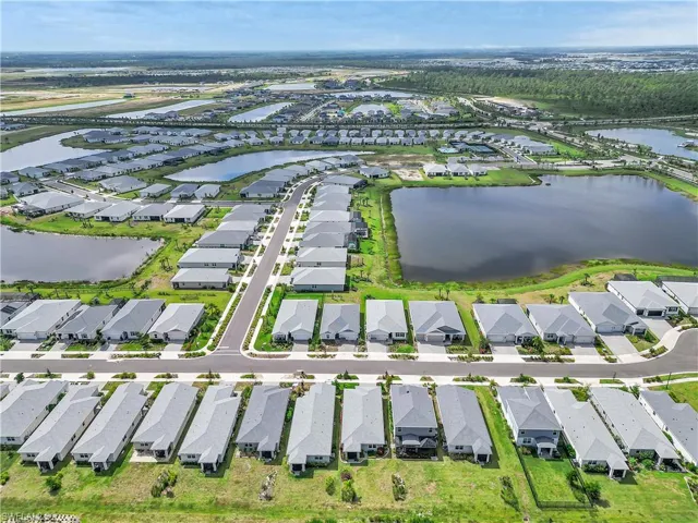 Aerial perspective of community area with a view of two of the many lakes.