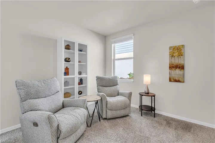 1st Bedroom/Den with carpet.