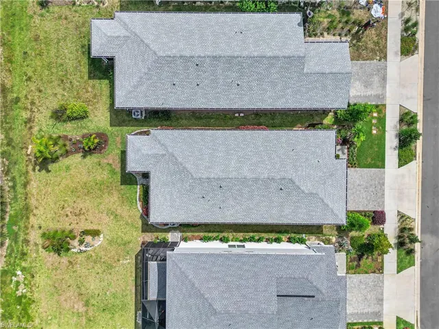 Drone / aerial view of home and yard.