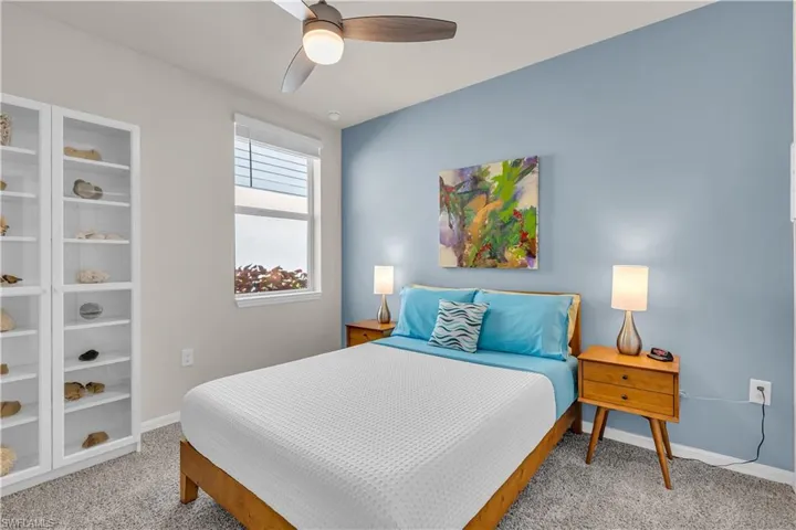 2nd Bedroom with carpet flooring and ceiling fan