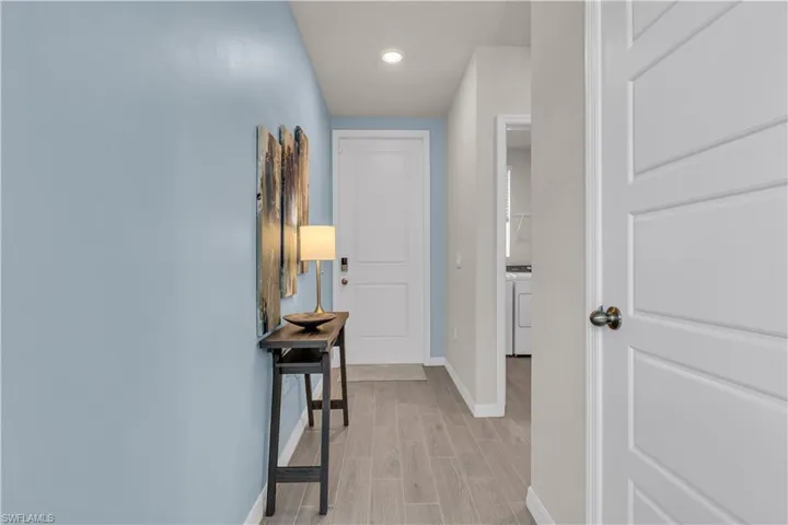 Front Door entrance with ceramic tile floors and recessed lighting