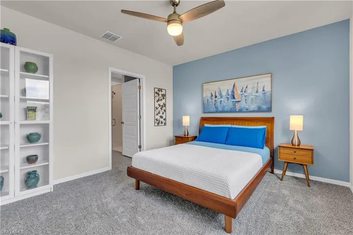 Master bedroom featuring large space for King size bed set, a ceiling, baseboards and carpet flooring.