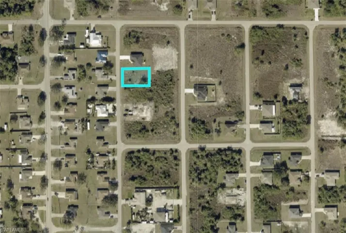 Aerial view of property's location with property parcel outlined