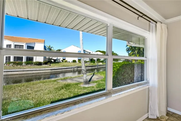 Detailed view of nearby water and baseboards