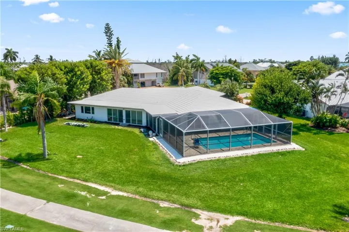View of the back of the home which is located on an almost half acre with THE BEST views!