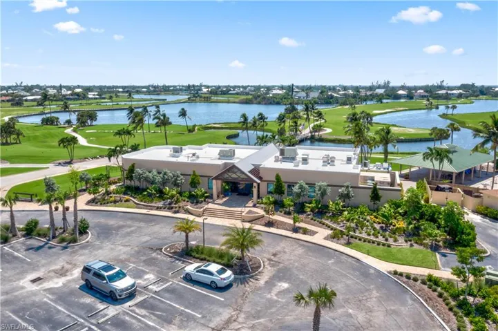 Located on one of the best lots if not THE BEST lot in The Dunes! Almost half acre with panoramic views of the golf course and lakes!