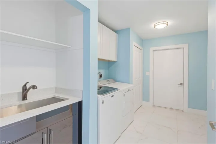 Details galore!  Master bedroom is super spacious and offers an additional room which is open to the master and has access to the outdoor patio!  Perfect for a work out room, office or expanded living space!