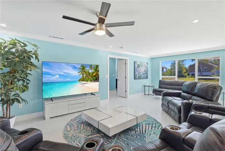 This whole home was renovated with permits and attention to detail.  All high end tile throughout the home, with three generous sized bedrooms (master split) and an additional den/living space in the master bedroom!