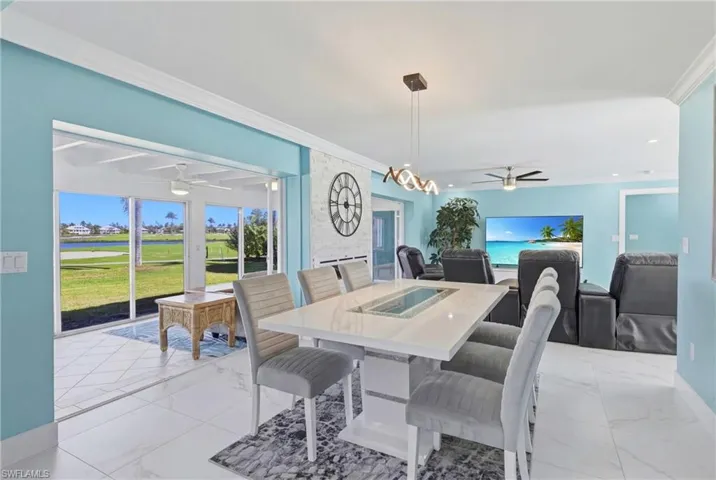 Dining area with full sliders to extend both the indoor and outdoor living space!