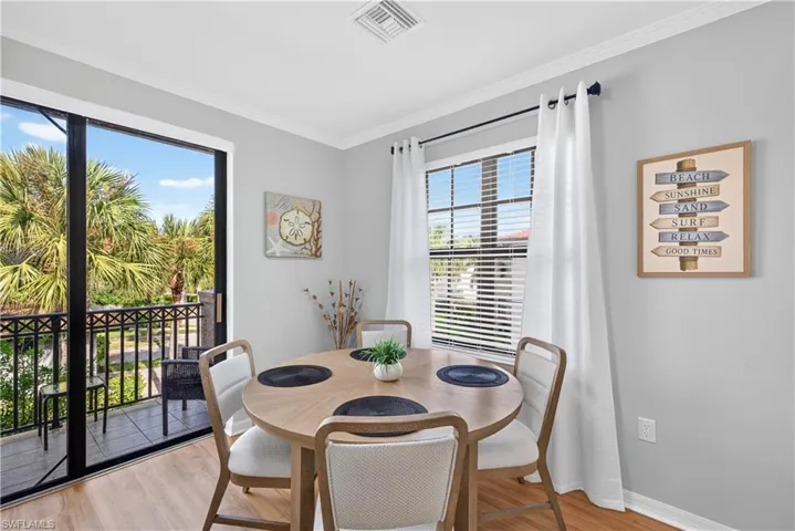 Sliding glass door leading to a private balcony